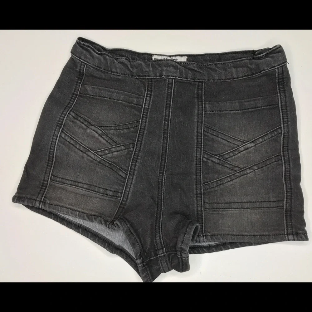 Free People 24 factory faded black shorts side zipper